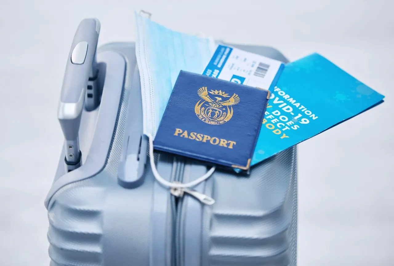 Passport and travel documents prepared for visa filing