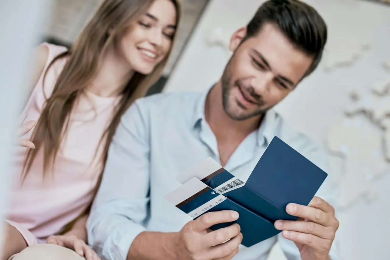 Traveler checking passport and tickets for a visit visa